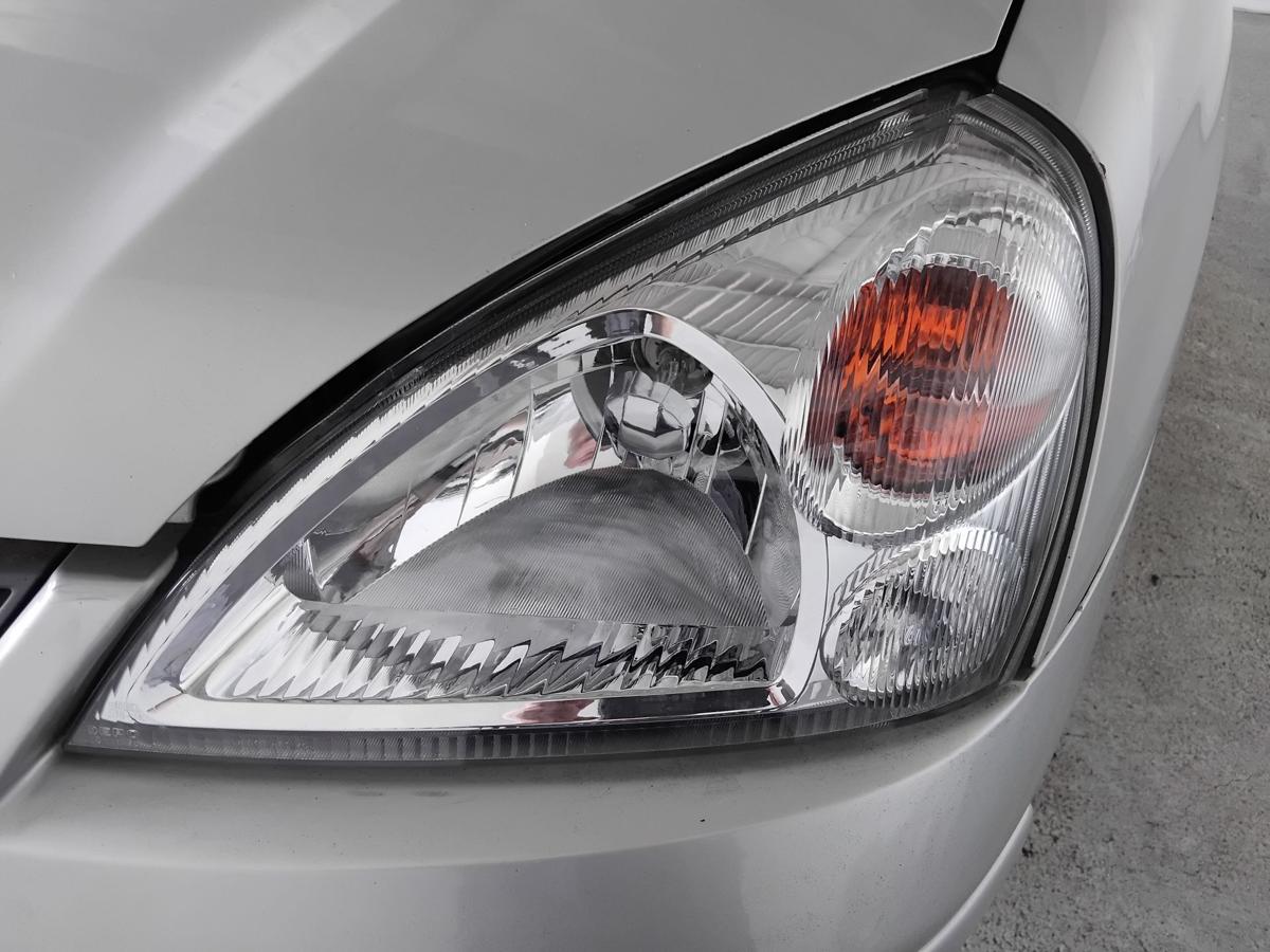 Suzuki Liana Scheinwerfer links Depo Halogen mit LWR BJ2004
