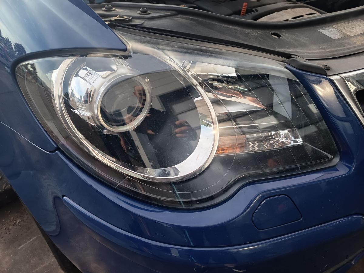 VW Touran GP 1T original Hauptscheinwerfer rechts Halogen Frontlicht Bj 2009