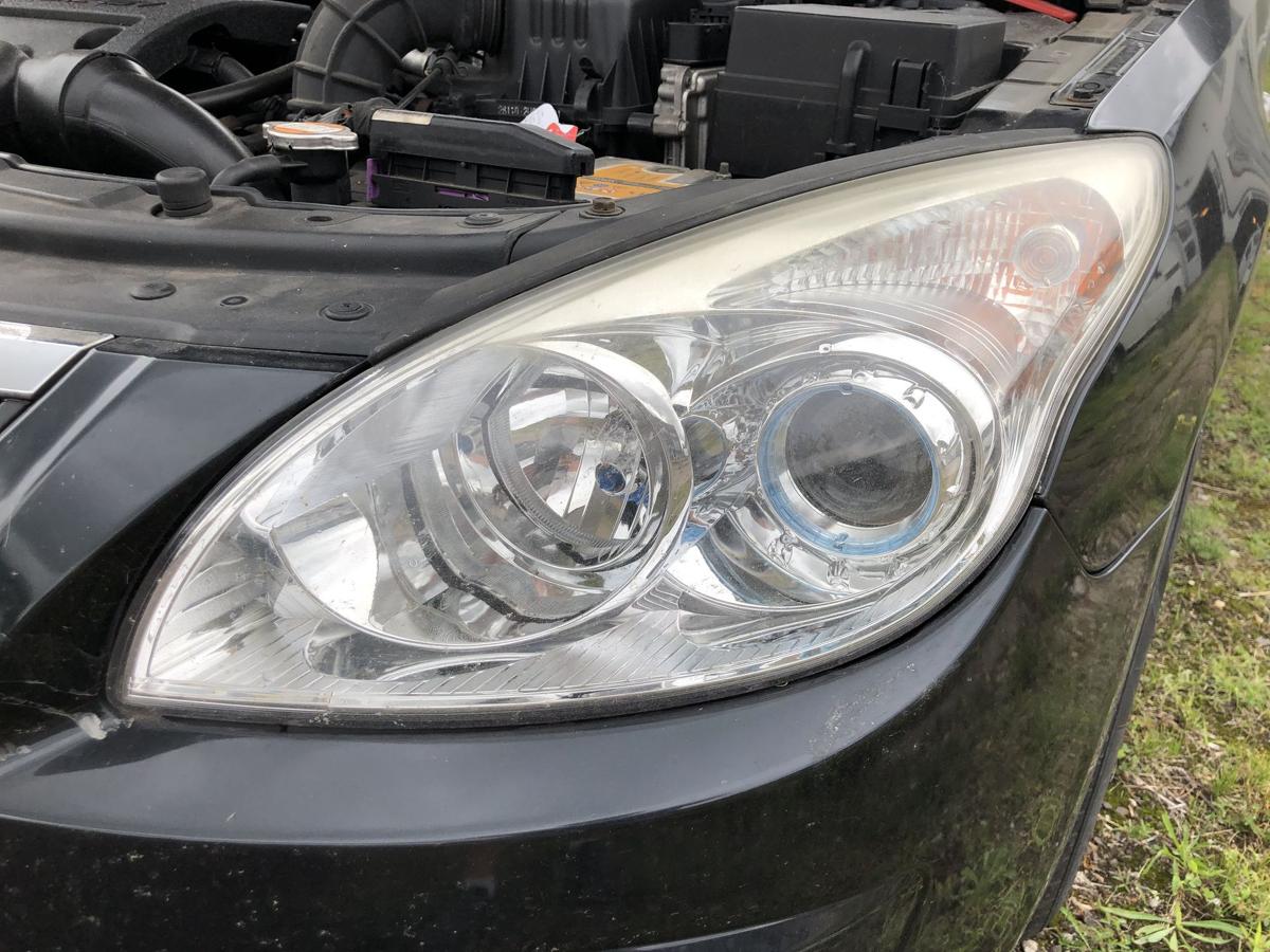 Hyundai i30 FD Scheinwerfer links Hauptscheinwerfer Halogen Frontscheinwerfer