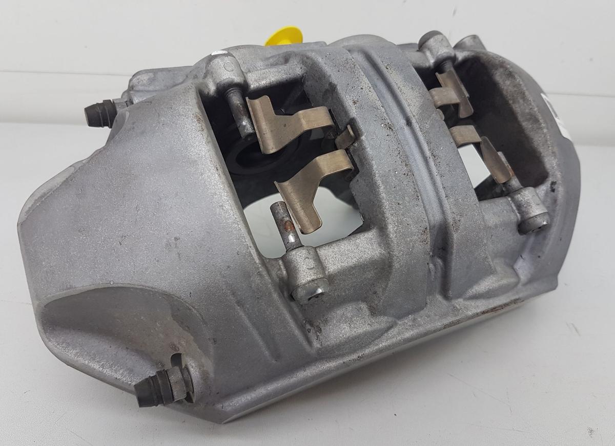 Tesla Model Y Bremssattel vorn links Bj2022 2288621-00-A inkl Tr&auml;ger