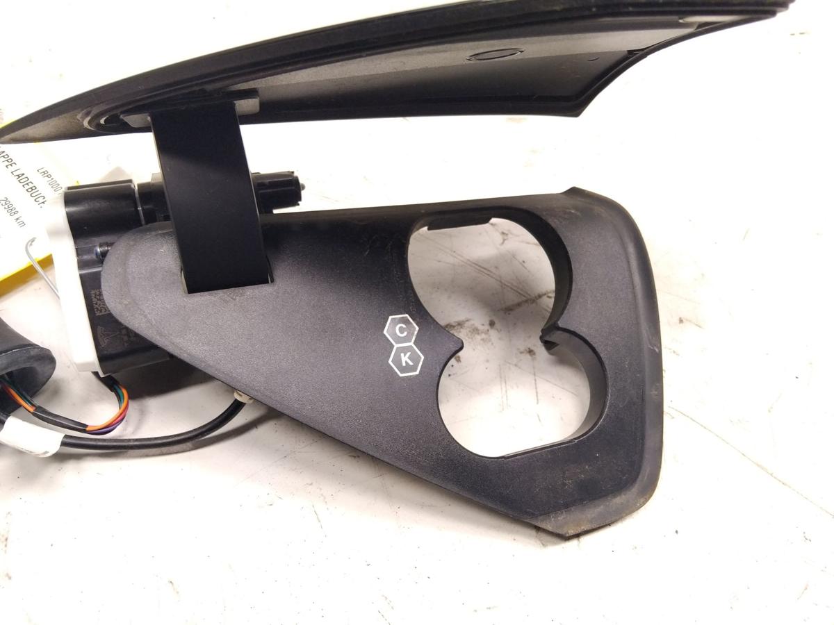 Tesla Model Y orig Ladeklappe Blende Reflektor links Klappe Ladebuchse BJ2023
