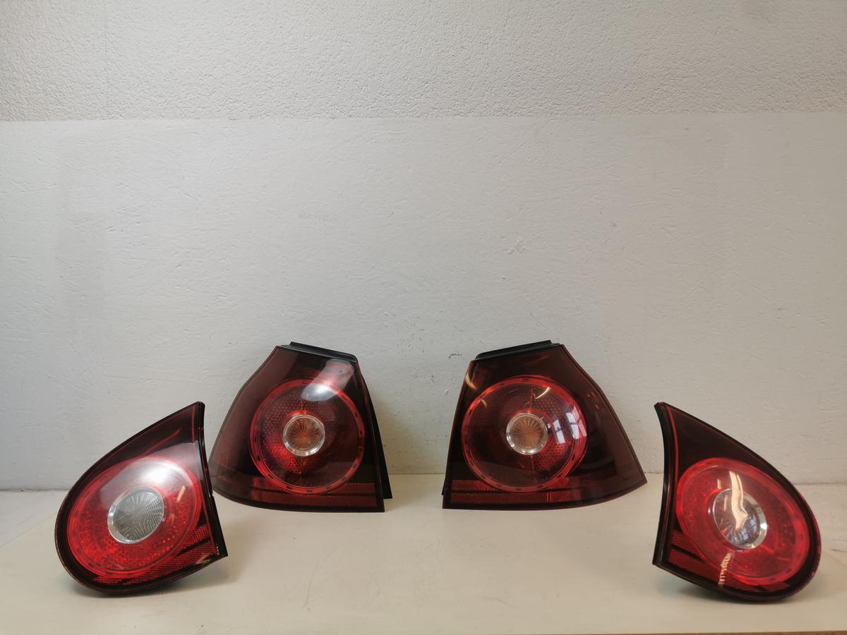 VW Golf 5 V 1K Satz R&uuml;ckleuchten Kirschrot OEM GTI R32 Jubi R&uuml;cklicht Text lesen