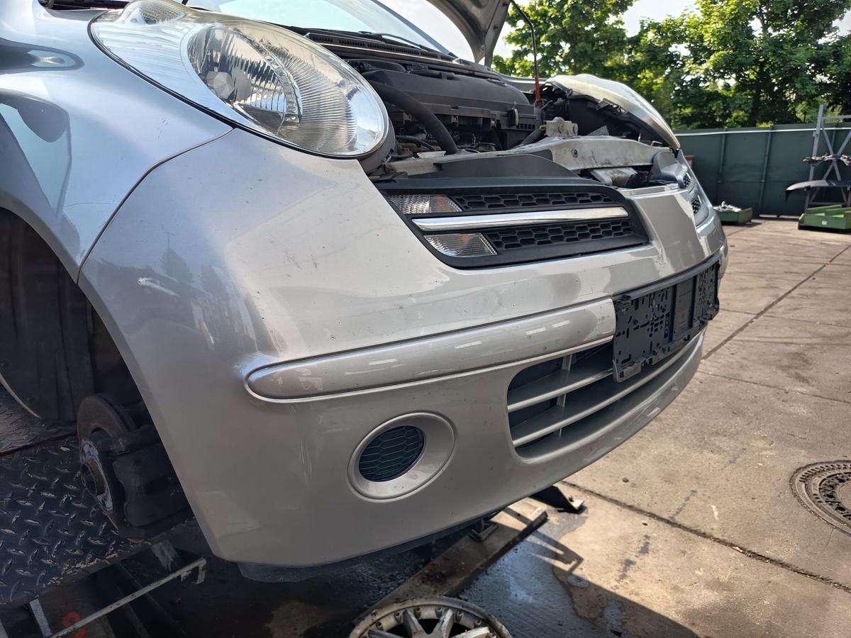 Nissan Micra K12 original Stoßstange Fänger vorn/Front KY0 Quarzsilber Bj 2006