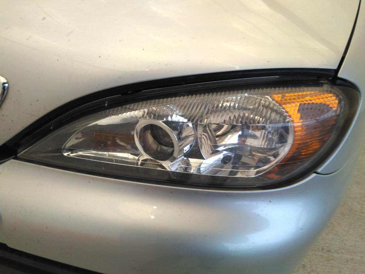 Nissan Primera P11 original Scheinwerfer vorn links Halogen Facelift