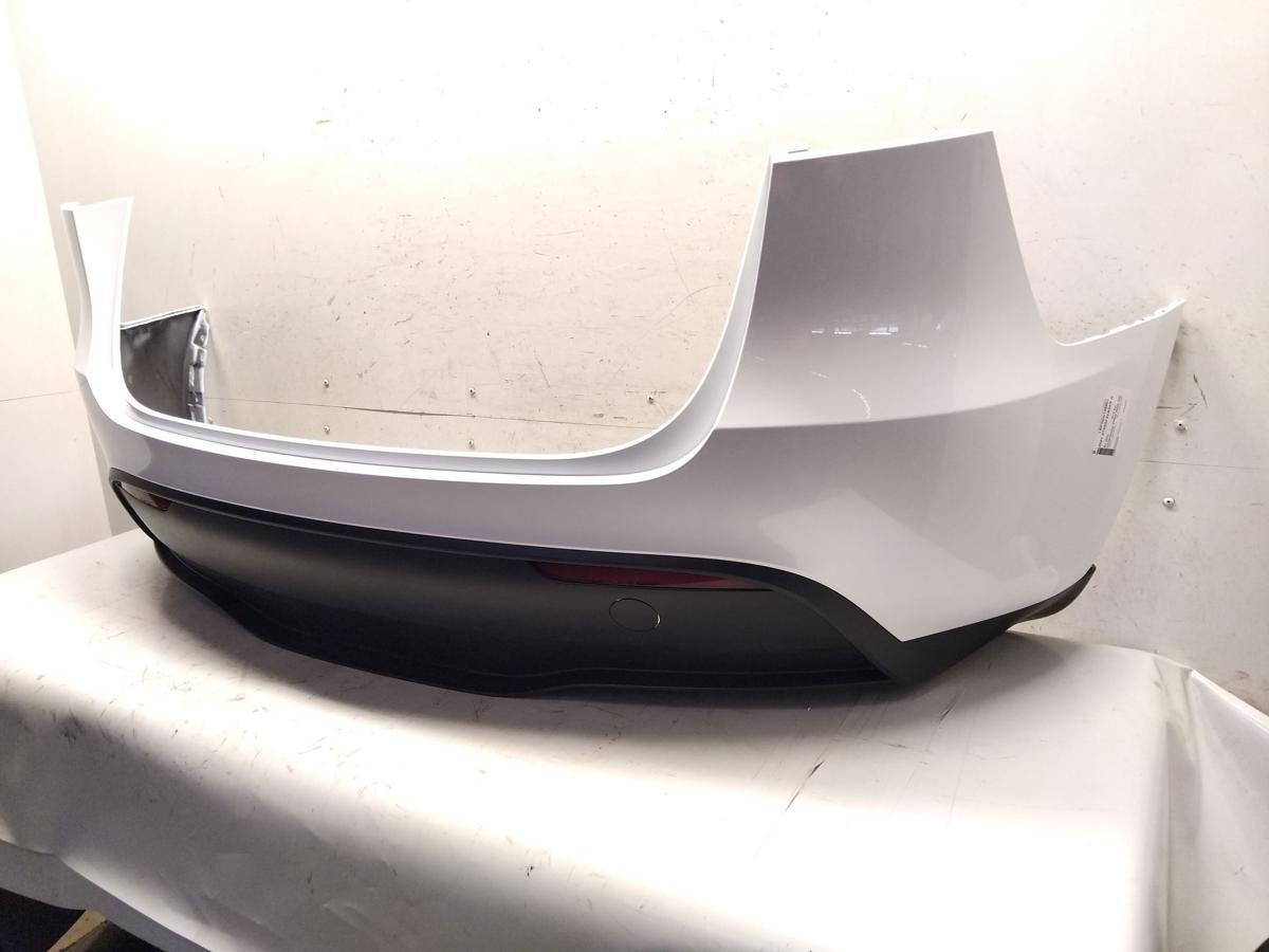 Tesla Model Y original Sto&szlig;stange Sto&szlig;f&auml;nger hinten weissmetallic PPSW BJ2022