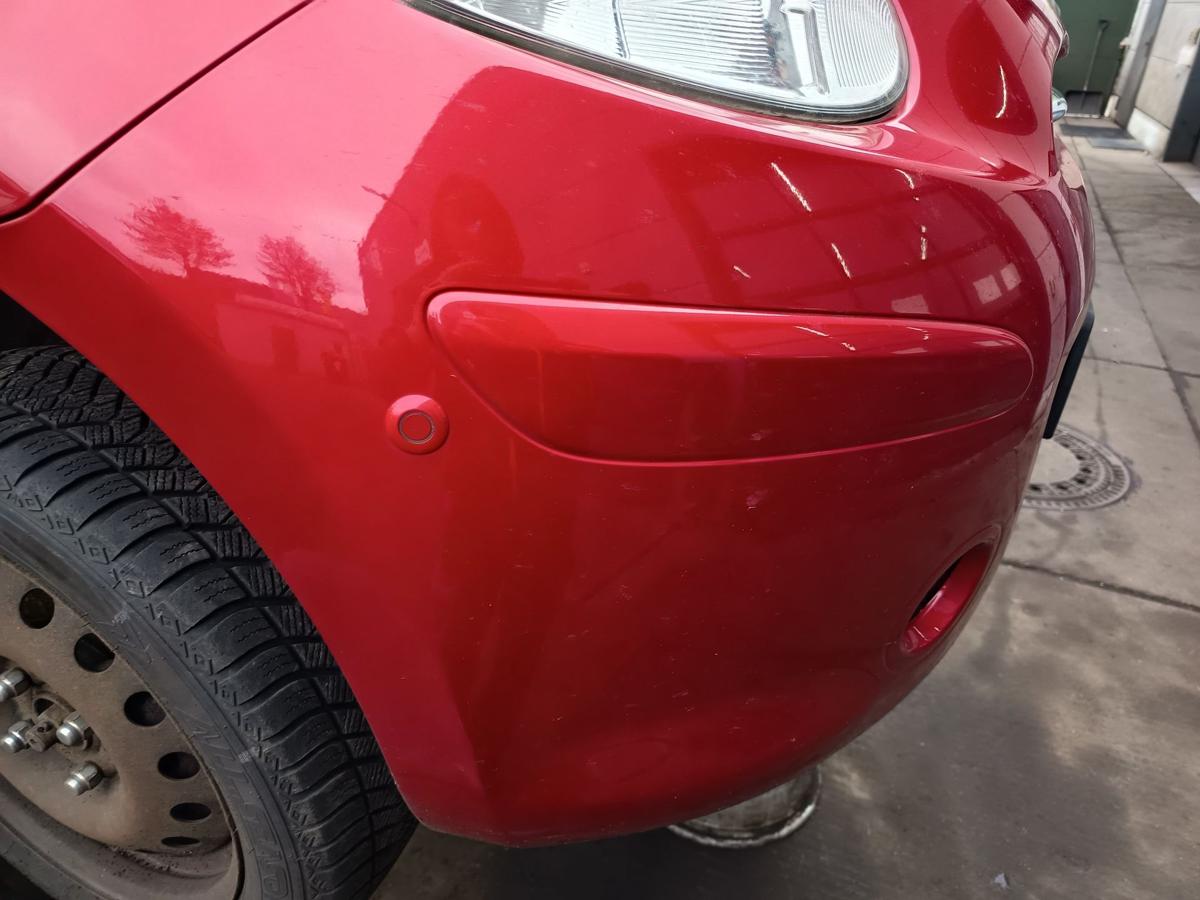 Nissan Micra K13 original Sto&szlig;stange F&auml;nger vorn Front AY4 Kaminrot Bj 2013