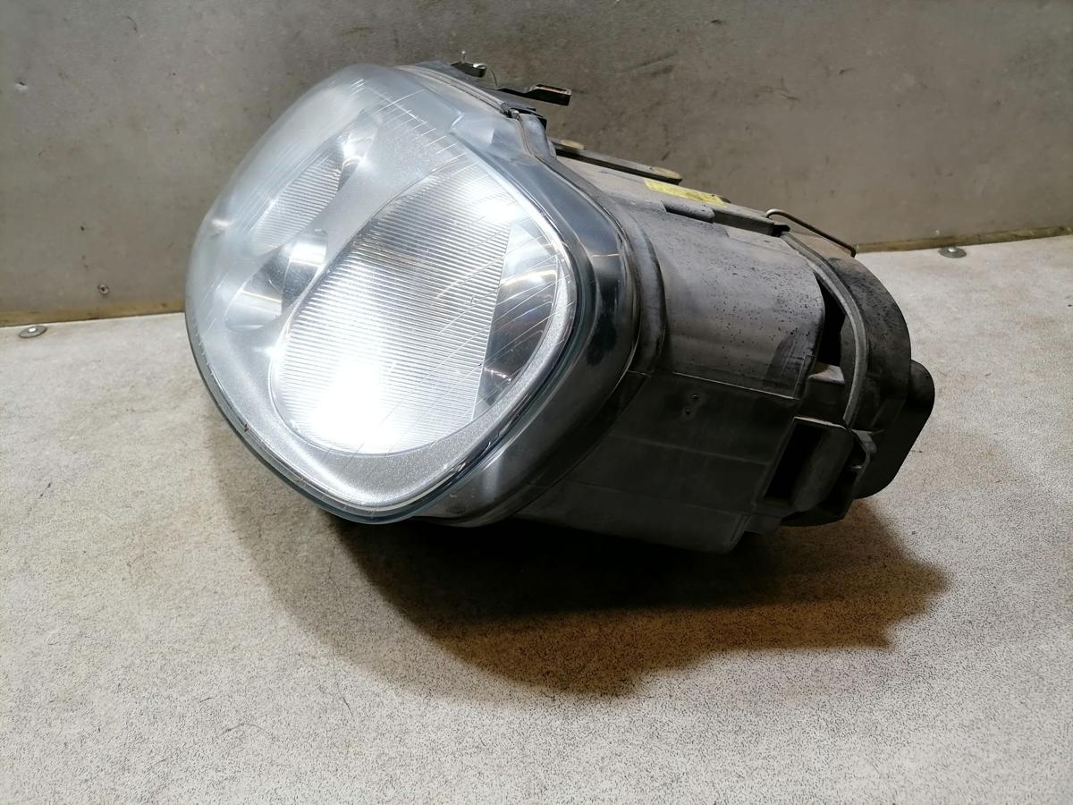 VW Caddy 2K original Scheinwerfer vorn links Halogen mit LWR Bj.2006