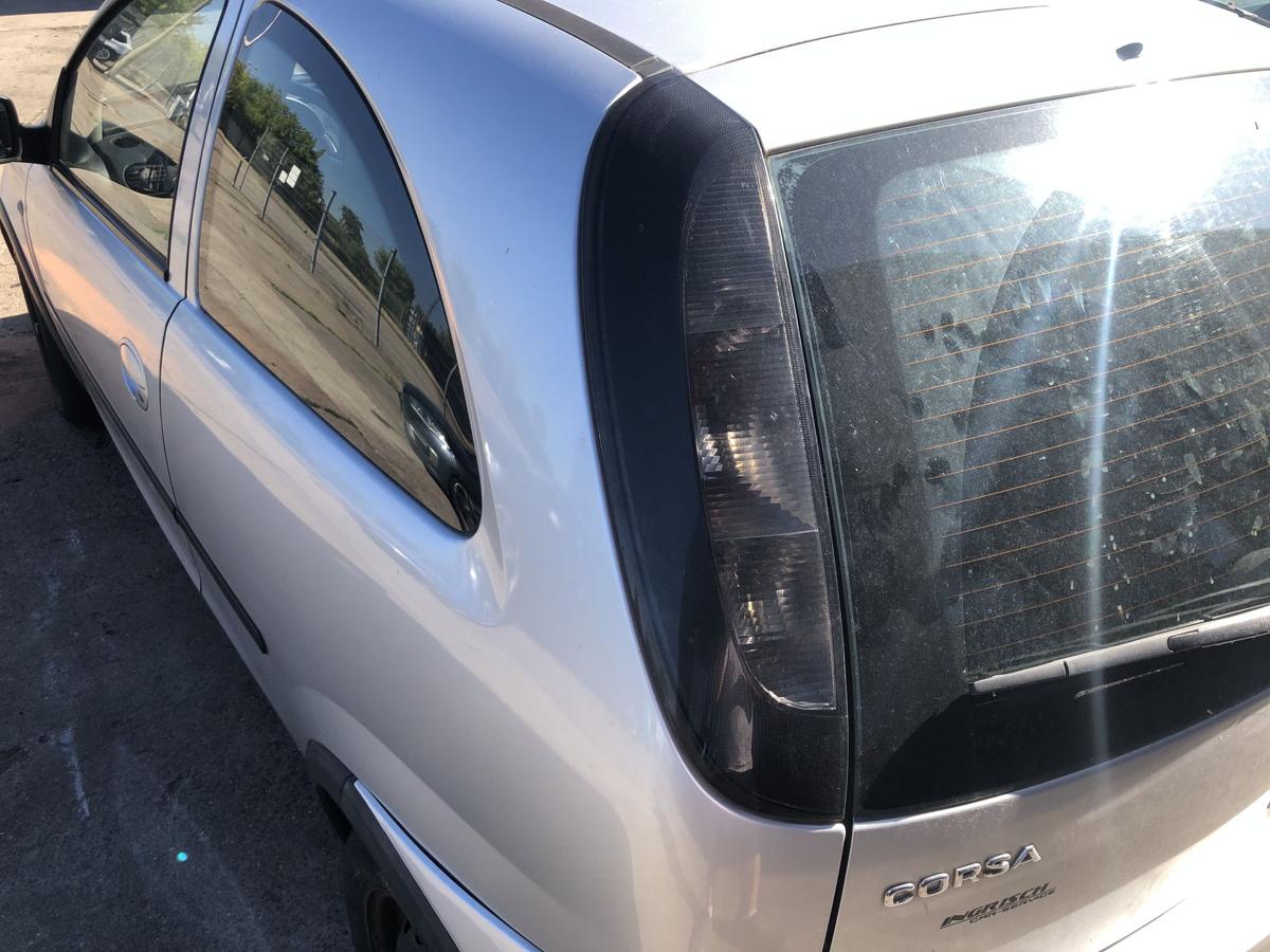 Opel Corsa C ab 2003 Rückleuchte links Rücklicht Heckleuchte dunkel getönt