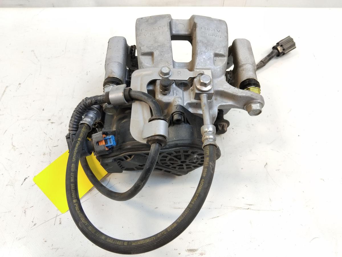 Tesla Model Y original Bremssattel Hinterachse rechts Mando 1044628-00-A Bj.2023