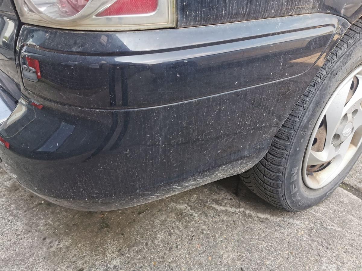 Hyundai Trajet FO Stossfänger Stossstange Bumper hinten EB Ebony Black TEXT