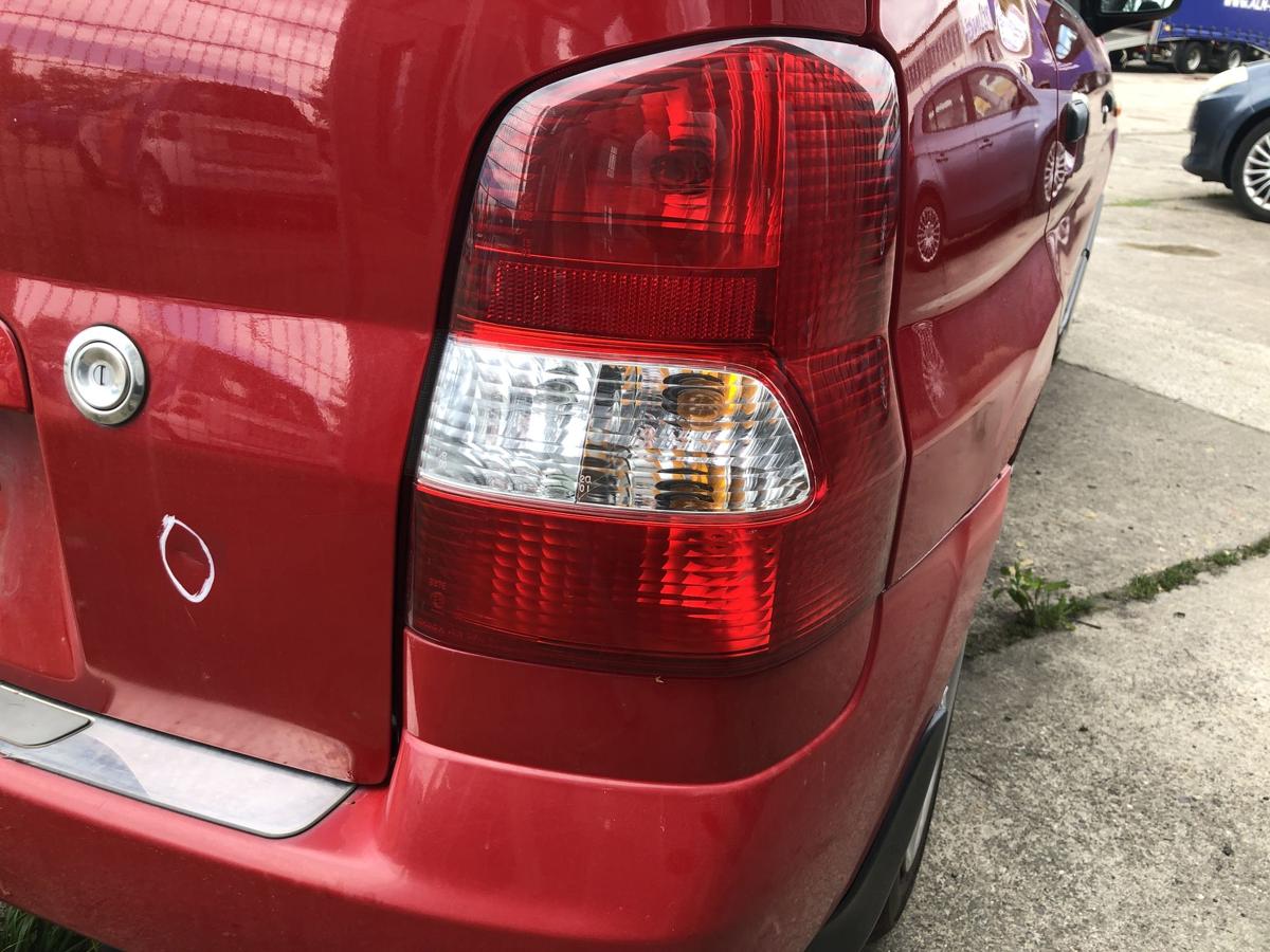 Mazda Demio DW R&uuml;ckleuchte links R&uuml;cklicht Heckleuchte Facelift ab 2000 kl Riss