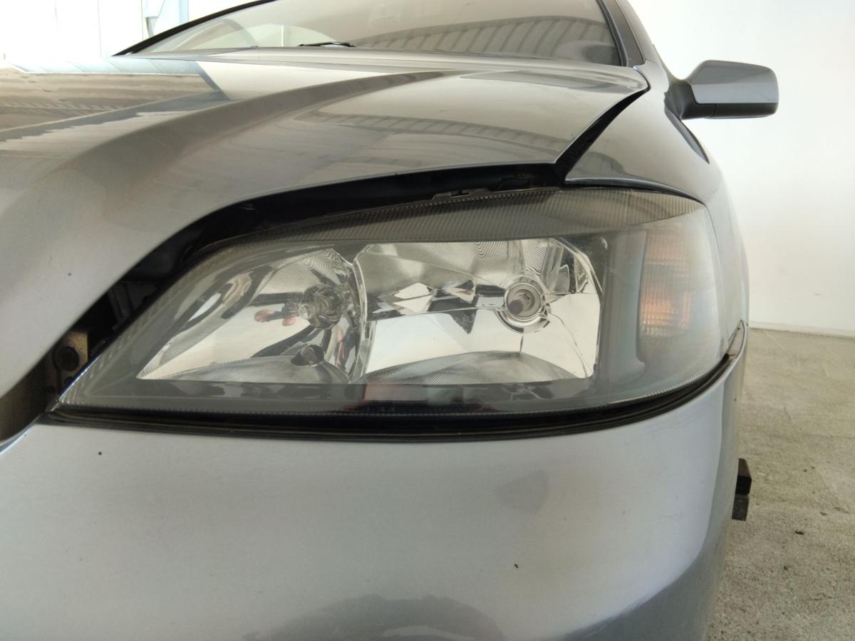 Opel Astra G Cabrio Scheinwerfer links Halogen mit LWR schwarz TYC BJ2004
