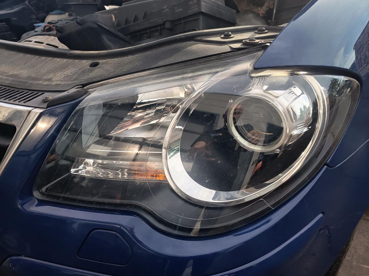 VW Touran GP 1T original Hauptscheinwerfer links Halogen Frontlicht Bj 2009