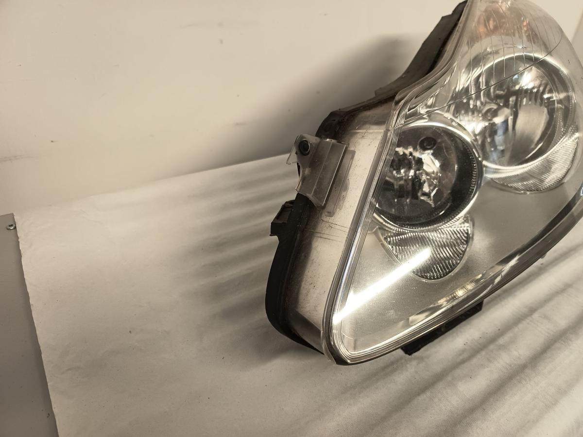 Opel Corsa D bis 2010 vor Facelift original Scheinwerfer vorn links