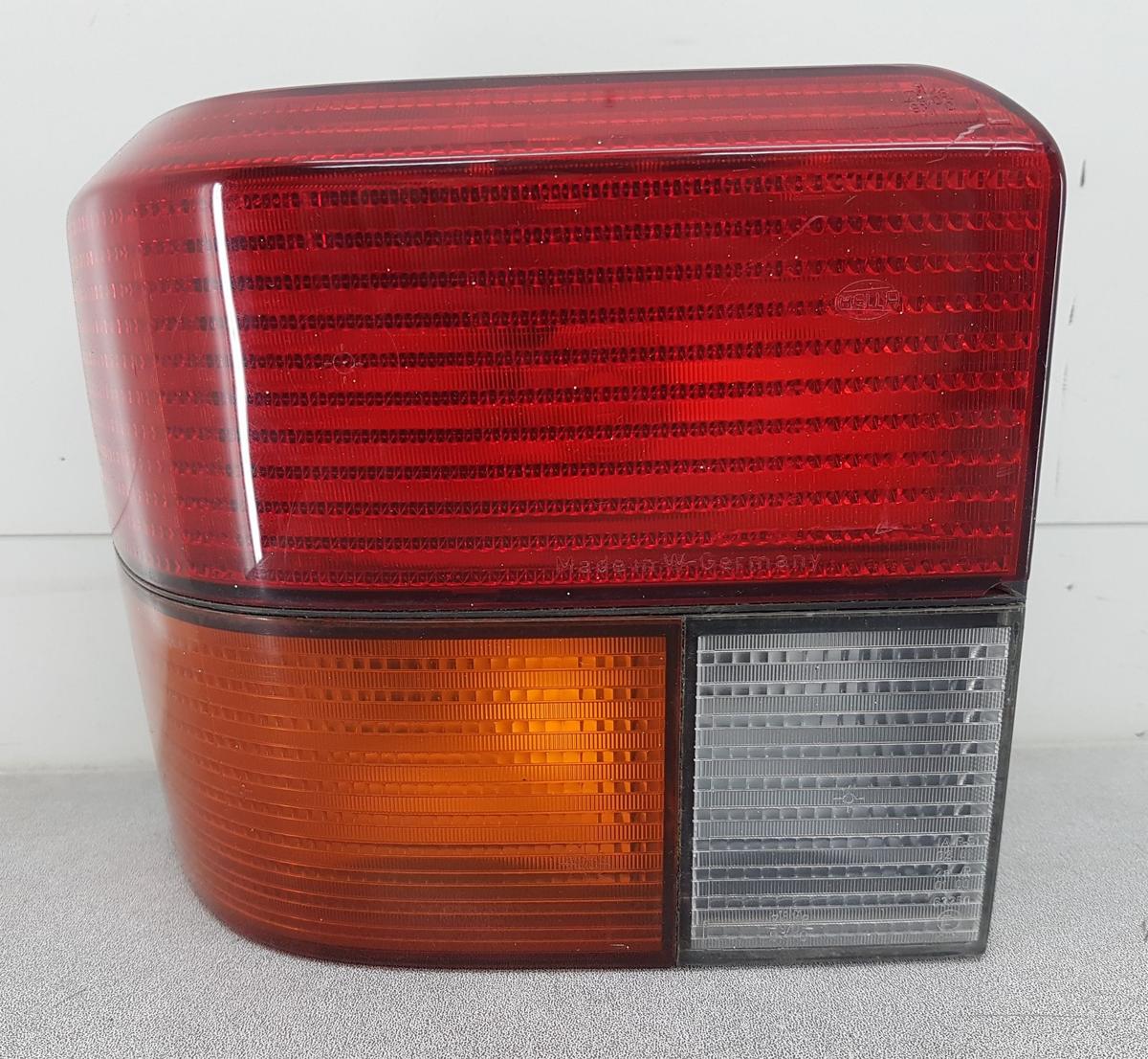 VW T4 R&uuml;ckleuchte R&uuml;cklicht links 9EL146371001 Bj1995