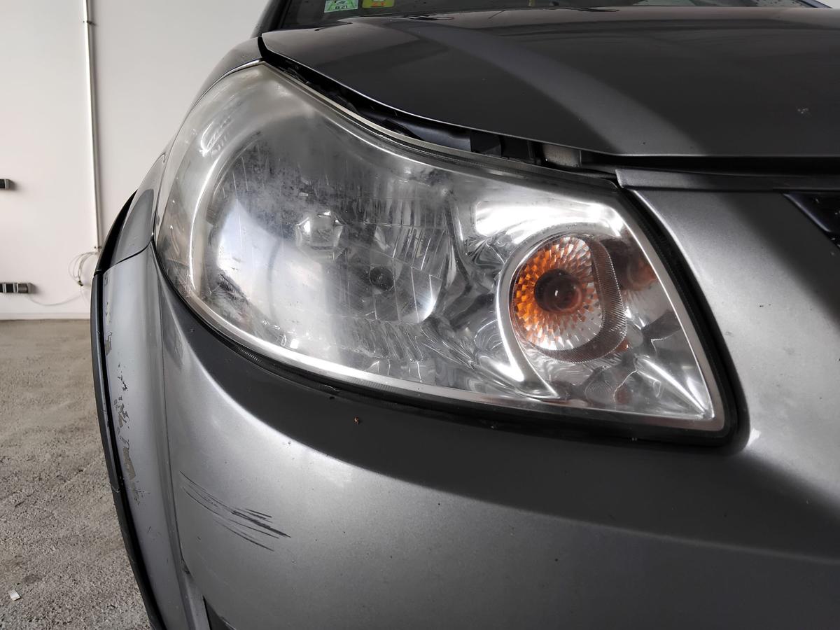 Suzuki SX4 original Scheinwerfer rechts Halogen mit LWR vergilbt trüb BJ2009