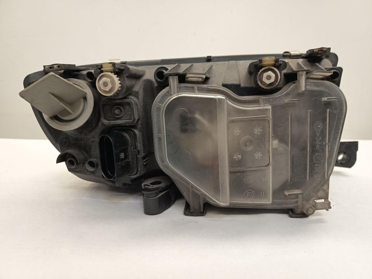 Skoda Fabia 6Y Limo Scheinwerfer vorn links schwarz/chrom Hella 246365 Bj 2003