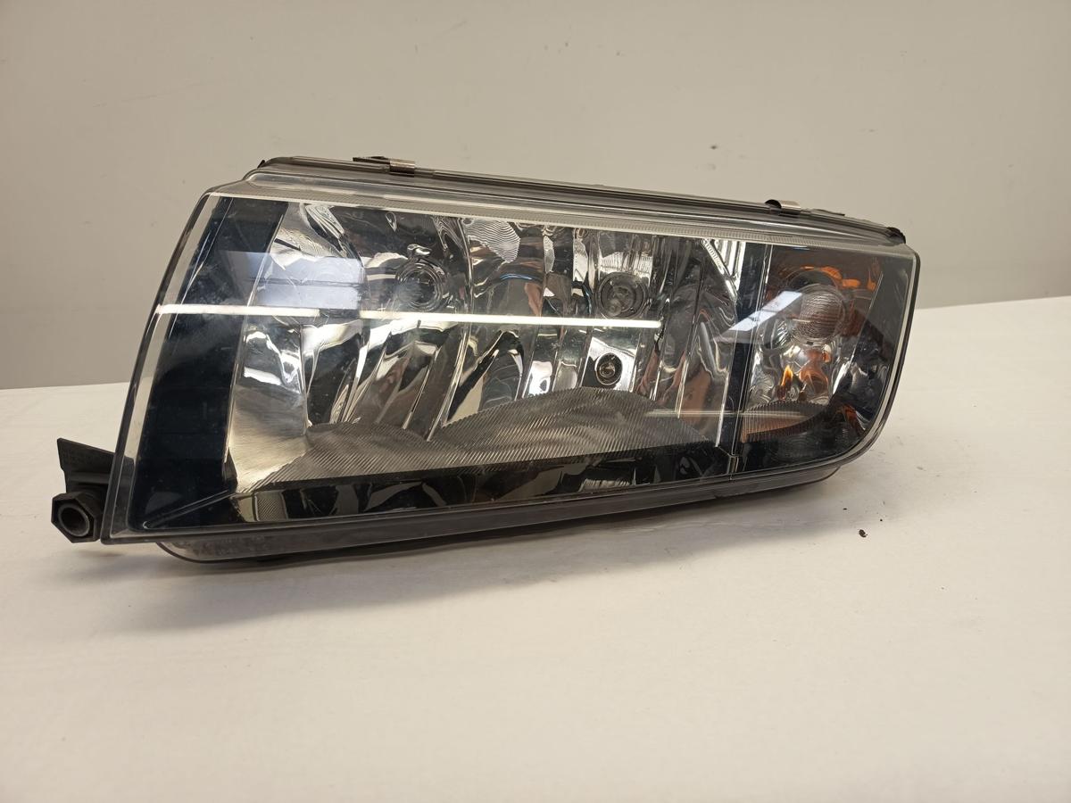 Skoda Fabia 6Y Limo Scheinwerfer vorn links schwarz/chrom Hella 246365 Bj 2003