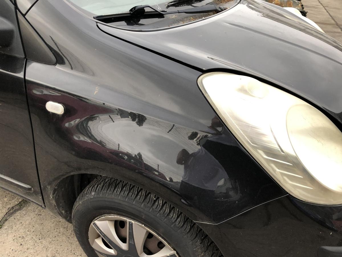 Nissan Note E11 Kotfl&uuml;gel vorn rechts Befahrerseite schwarz Delle