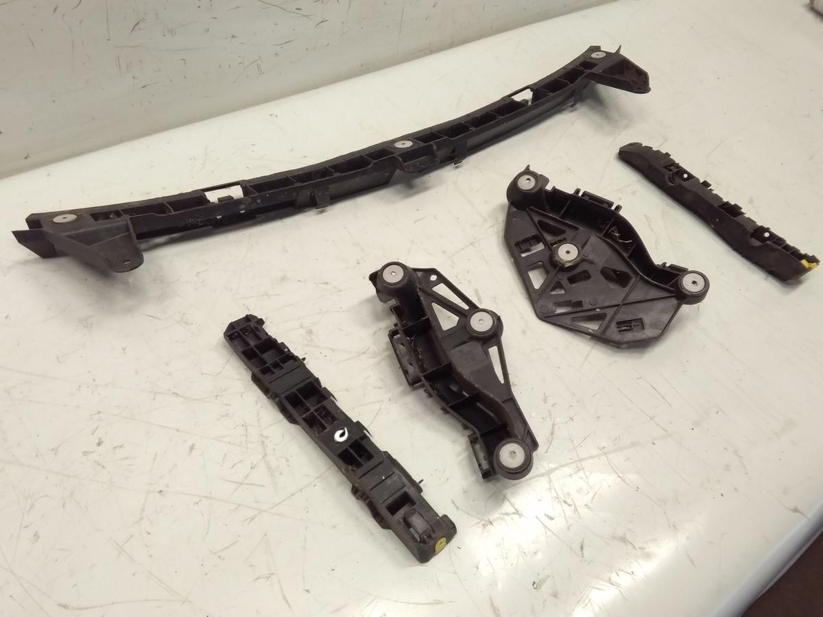 Opel Corsa E original Satz F&uuml;hrungen Halter Sto&szlig;f&auml;nger Sto&szlig;stange hinten Bj.2016