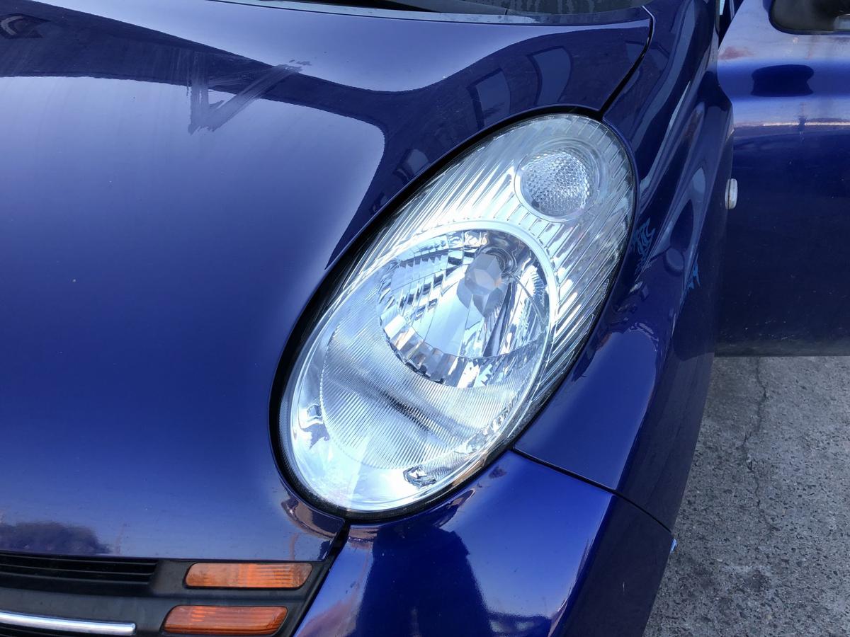Nissan Micra K12 Scheinwerfer links Frontscheinwerfer Zubehörteil TYC Text lesen