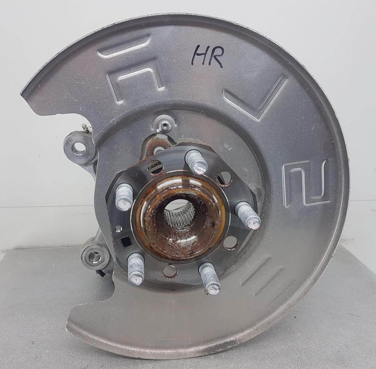 Tesla Model Y Achsschenkel hinten rechts Bj22 1188416-00-F 335x22mm Performance