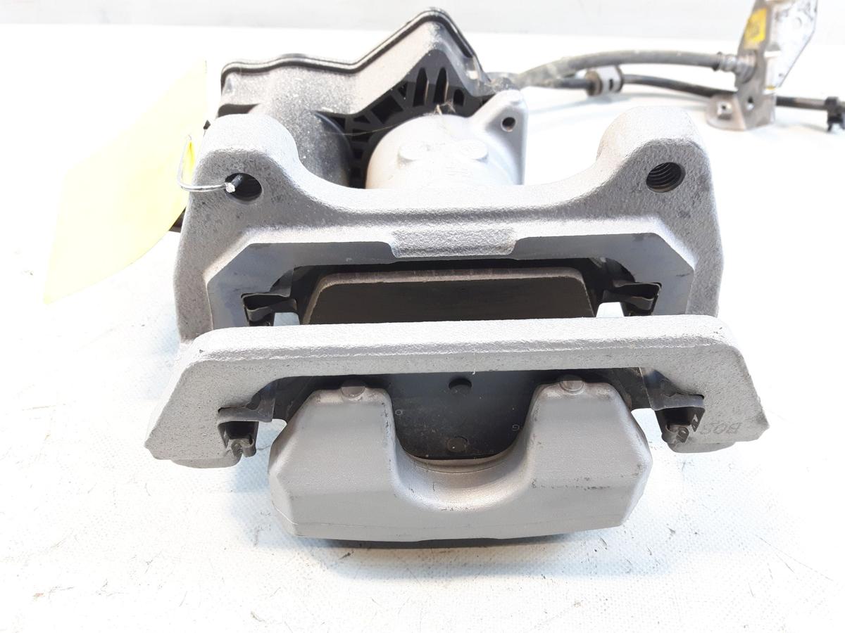 Tesla Model Y original Bremssattel Hinterachse rechts Mando 104462800A Bj2023