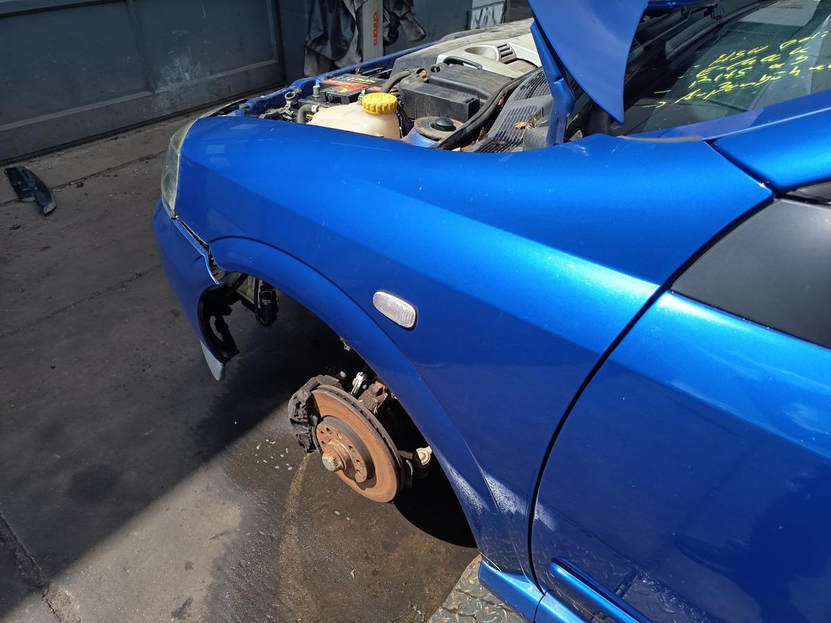 Opel Astra G Coupe original Kotfl&uuml;gel links Seitenteil 2KU Europablau Bj 2002