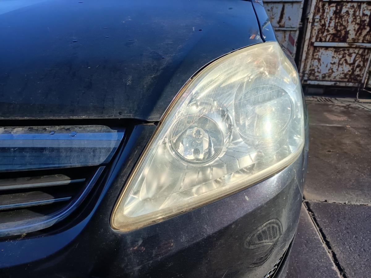 Opel Zafira B original Scheinwerfer links Halogen/Haupt/Licht/Front Bj 2009