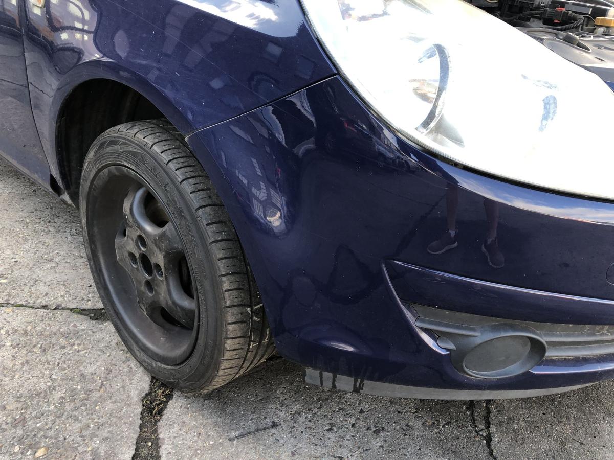 Opel Corsa D Stoßfänger vorn Frontstoßstange mit Grill Z20Z Royalblau Schaden