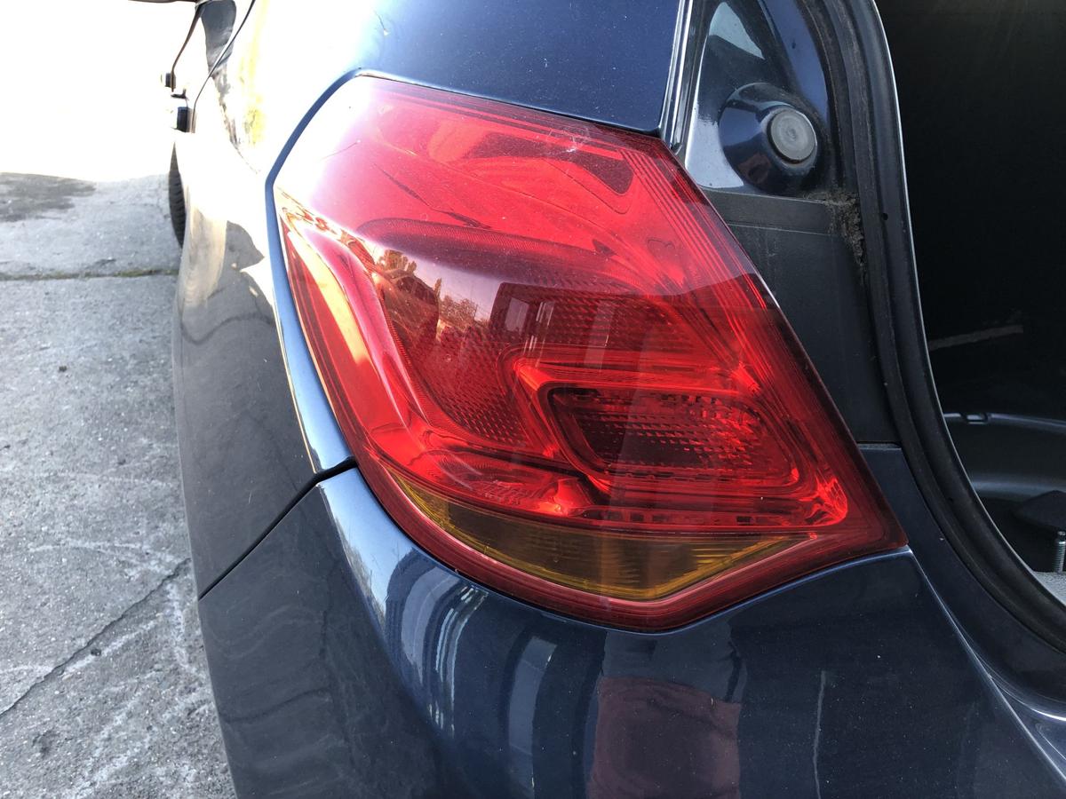 Opel Astra J Rückleuchte links Außenecke Rücklicht Heckleuchte Schlusslicht