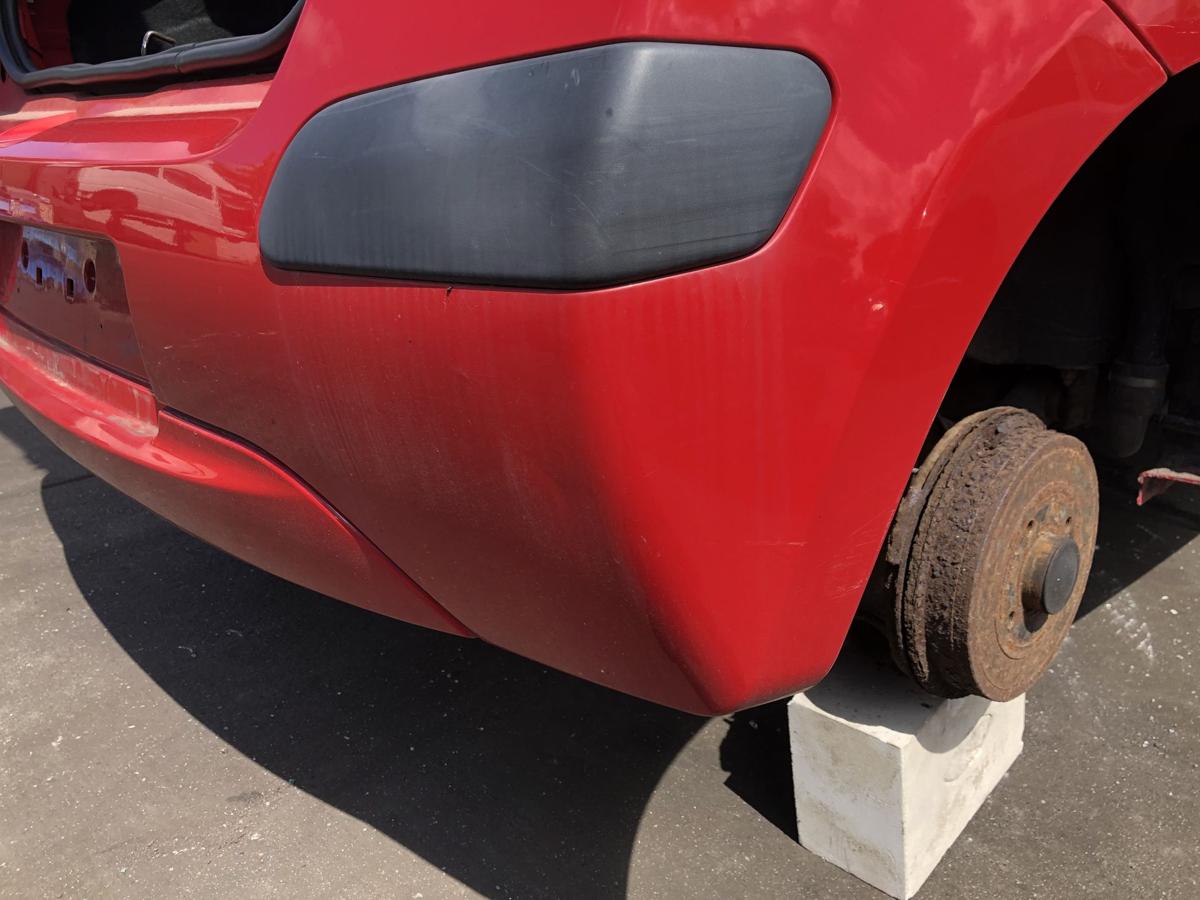 Renault Twingo II original Stoßstange Fänger hinten/Heck 727 Spanischrot Bj 2009