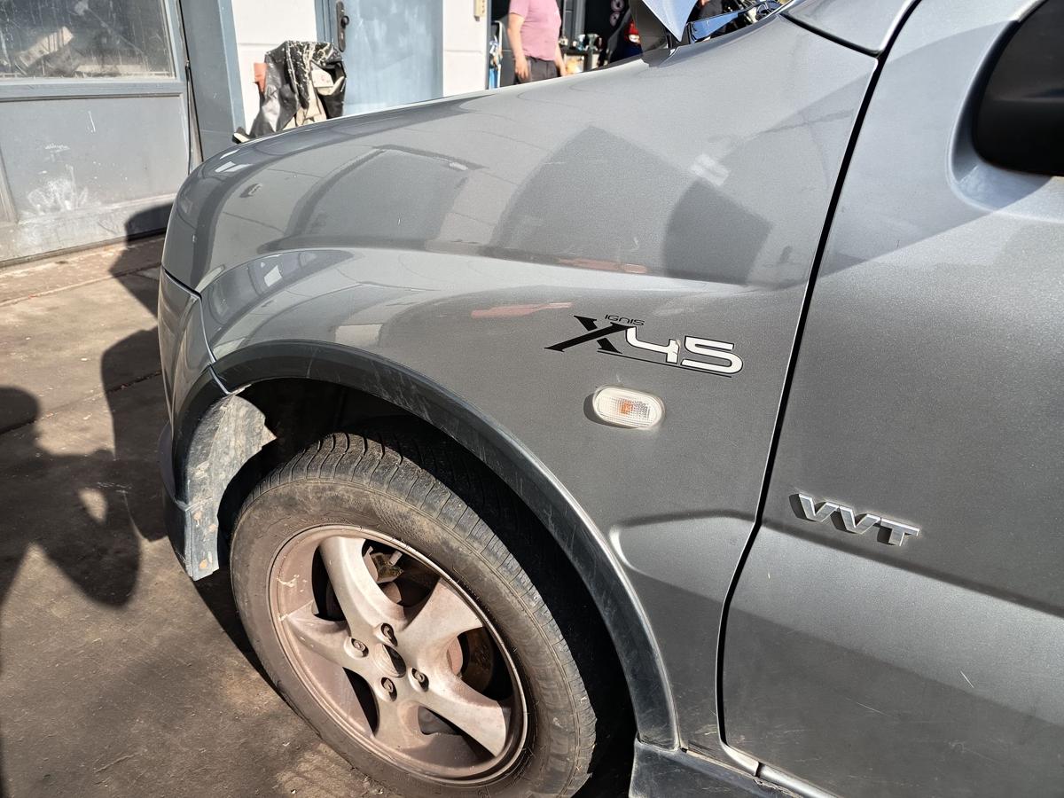 Suzuki Ignis MH original Kotfl&uuml;gel links C12 Midnight Grey Bj 2006