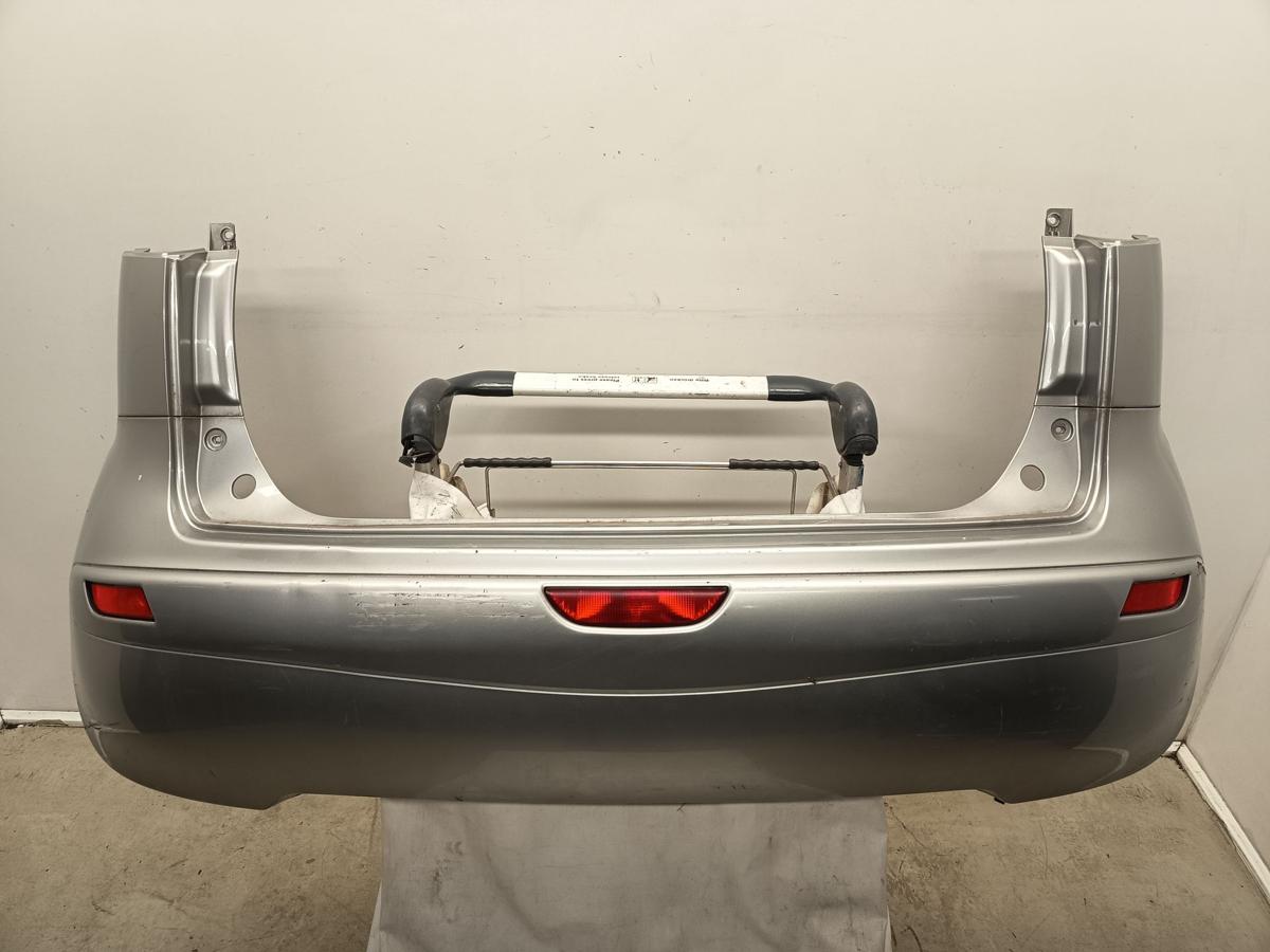 Nissan Note E11 original Stoßstange Stossfänger hinten KYO Quarzsilber Bj 2006