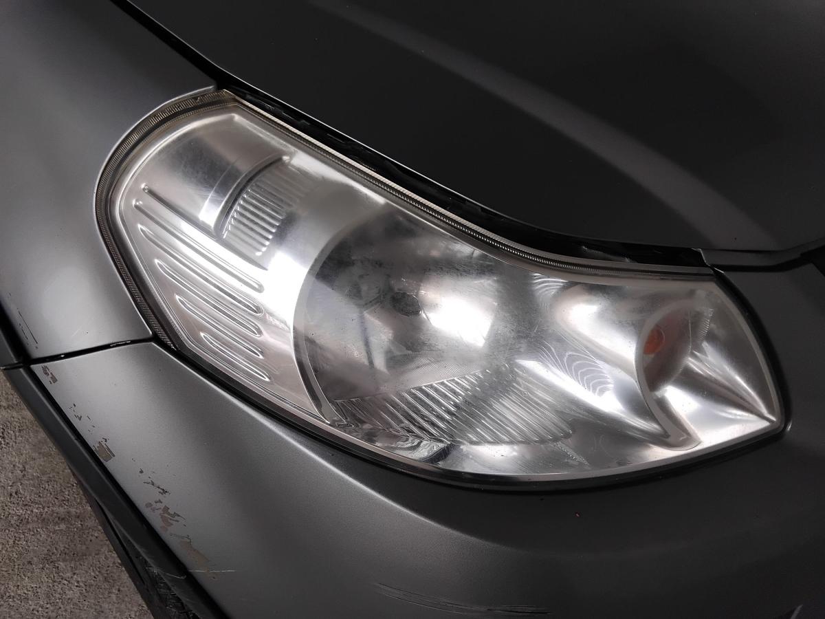 Suzuki SX4 original Scheinwerfer rechts Halogen mit LWR vergilbt trüb BJ2009