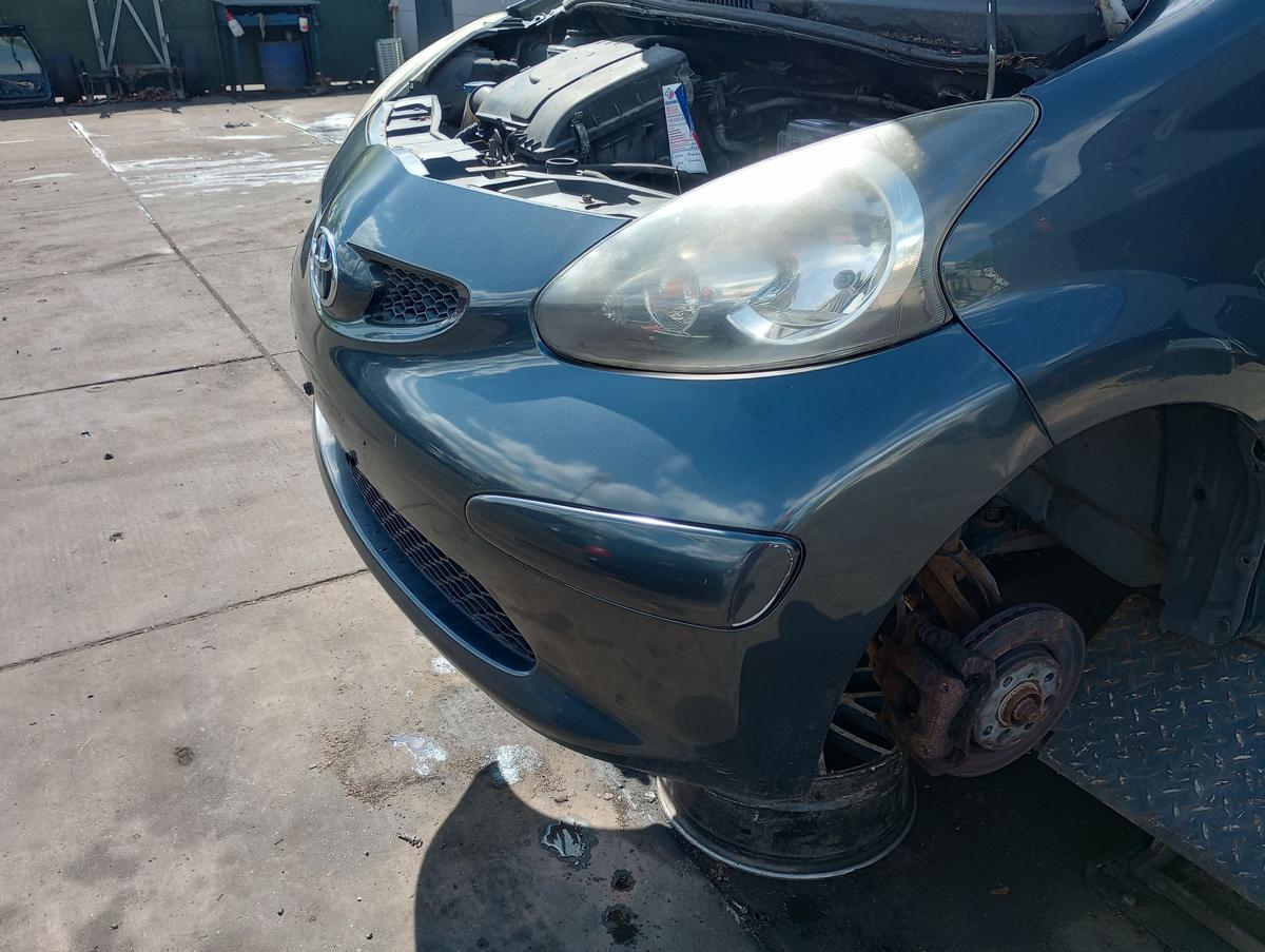 Toyota Aygo 1 orig Stoßstange Stossfänger vorn 1E0 Rauchgrau mica Bj 2005