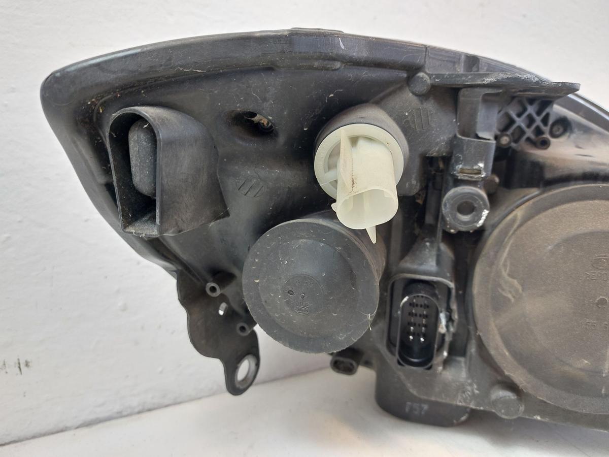 Skoda Fabia 5J Scheinwerfer links Hauptscheinwerfer Bi-Halogen Hella OEM bis 10