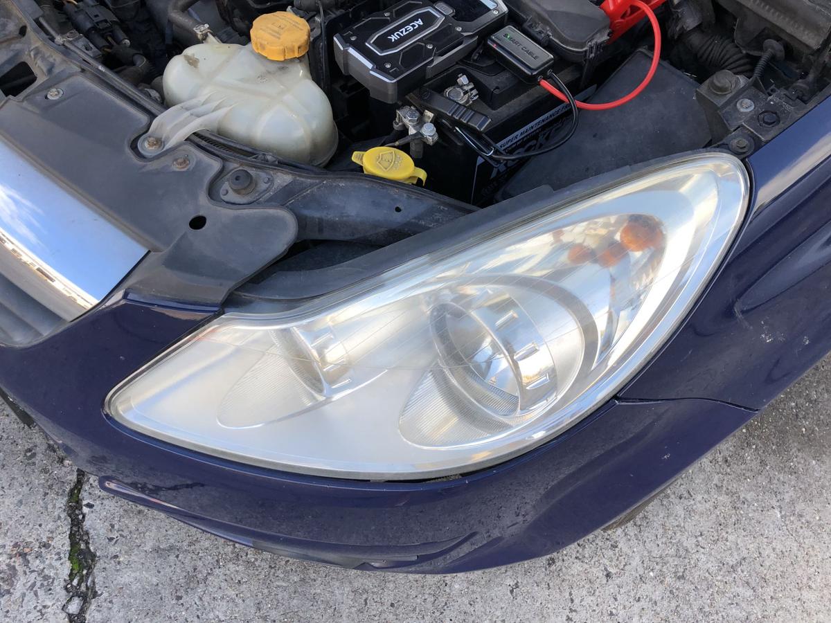 Opel Corsa D Scheinwerfer links Frontscheinwerfer Halogen OEM Trüb bis 2010
