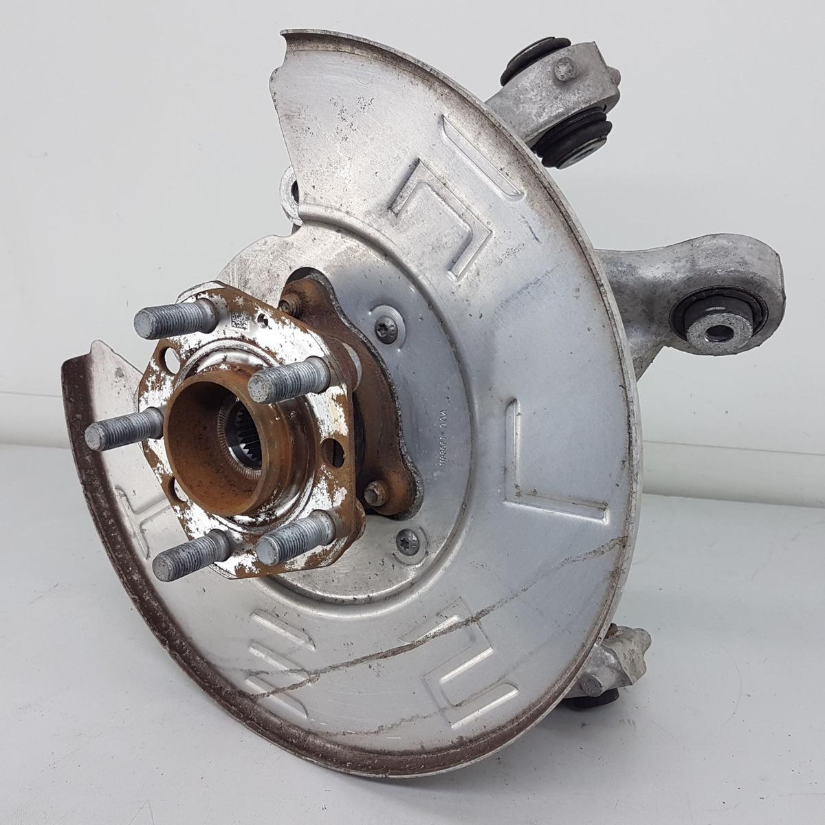 Tesla Model Y Achsschenkel hinten links Bj2022 1188411-00-F 335x20mm