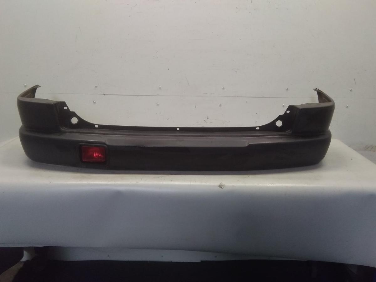 Mazda Demio original Stoßstange Stoßfänger hinten unlackiert BJ1998