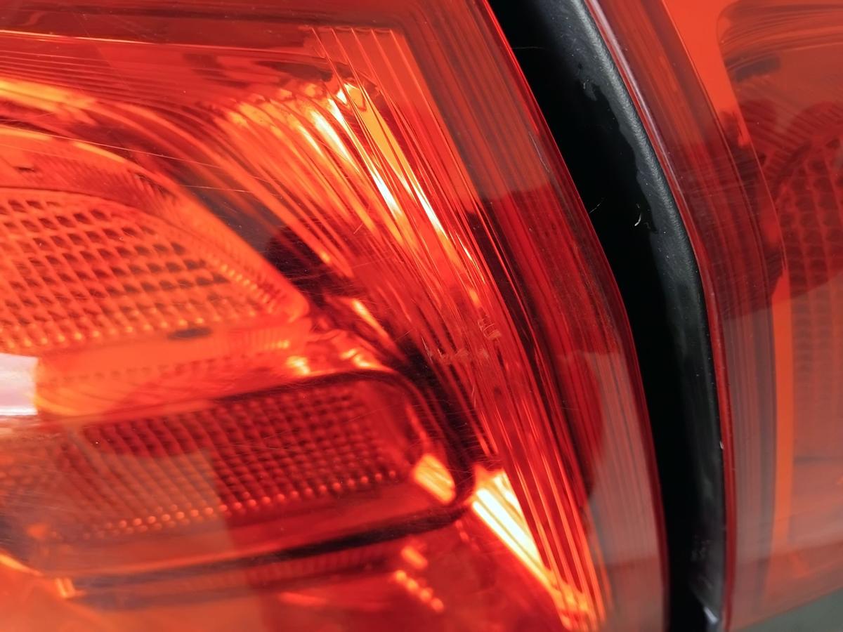 Opel Astra J Sports Tourer orig.Rückleuchte Schlussleuchte links aussen BJ2011