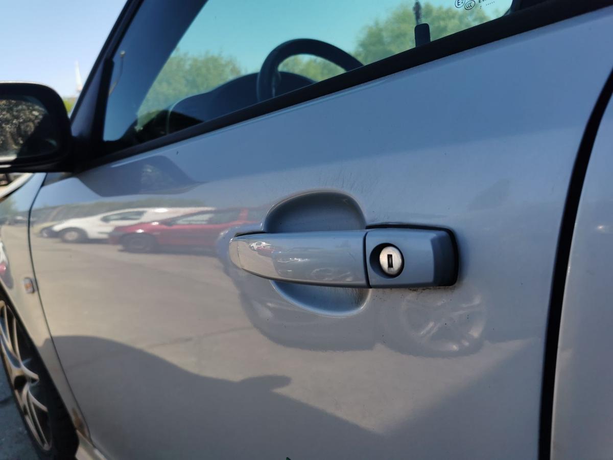 Saab 9-3 YS3 Kombi Fahrertür Tür Autotür vorn links 309 Kristallsilber Rohbautür