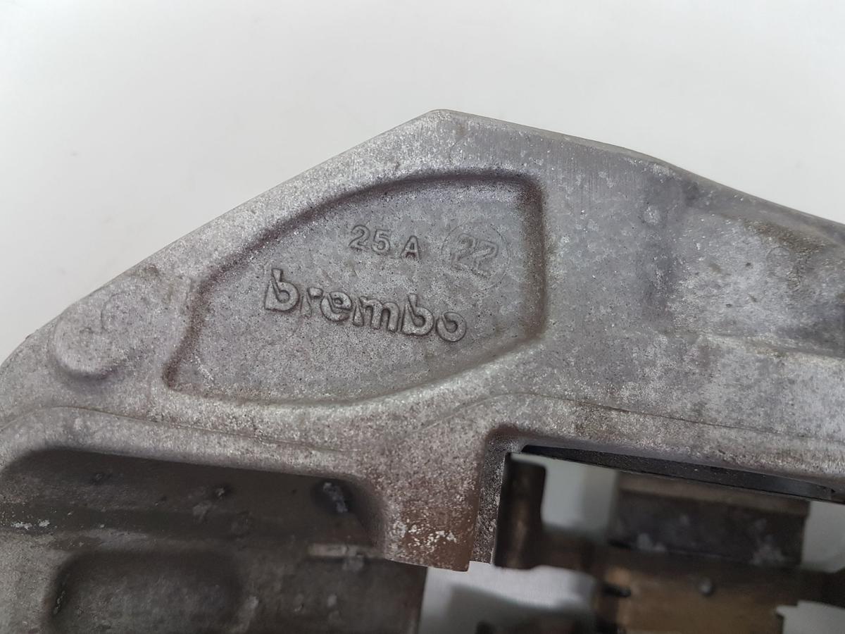 Tesla Model Y Bremssattel vorn links Bj2022 2288621-00-A inkl Tr&auml;ger