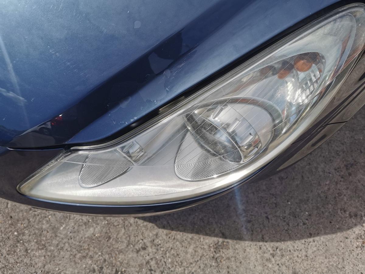Opel Corsa D Scheinwerfer Frontscheinwerfer Hauptscheinwerfer vorn links OE