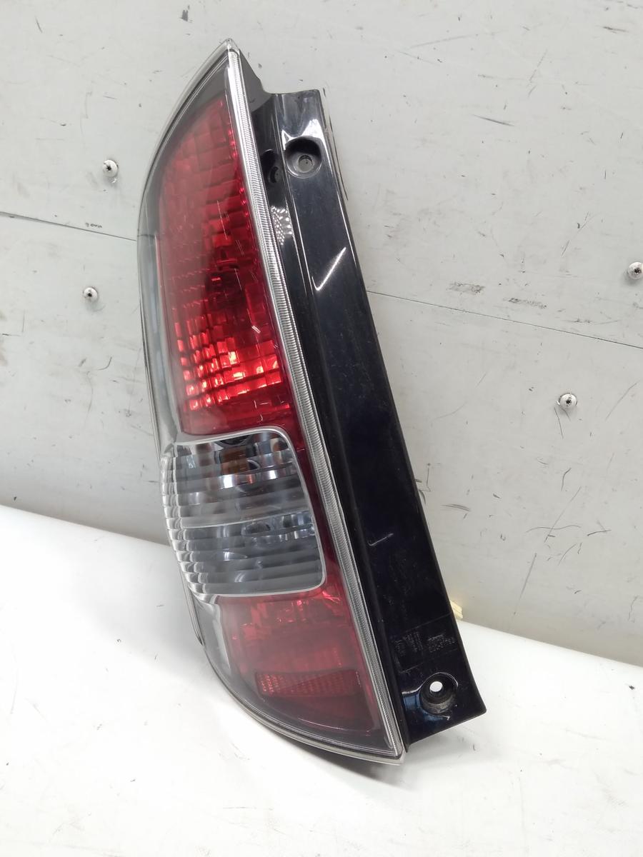 Daihatsu Sirion 2 M300 original Rückleuchte Heckleuchte links BJ2008