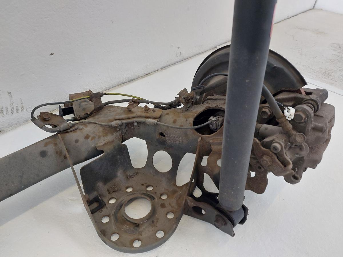Toyota IQ Typ AJ Hinterachse Achse hinten Achsk&ouml;rper mit Schiebenbremse