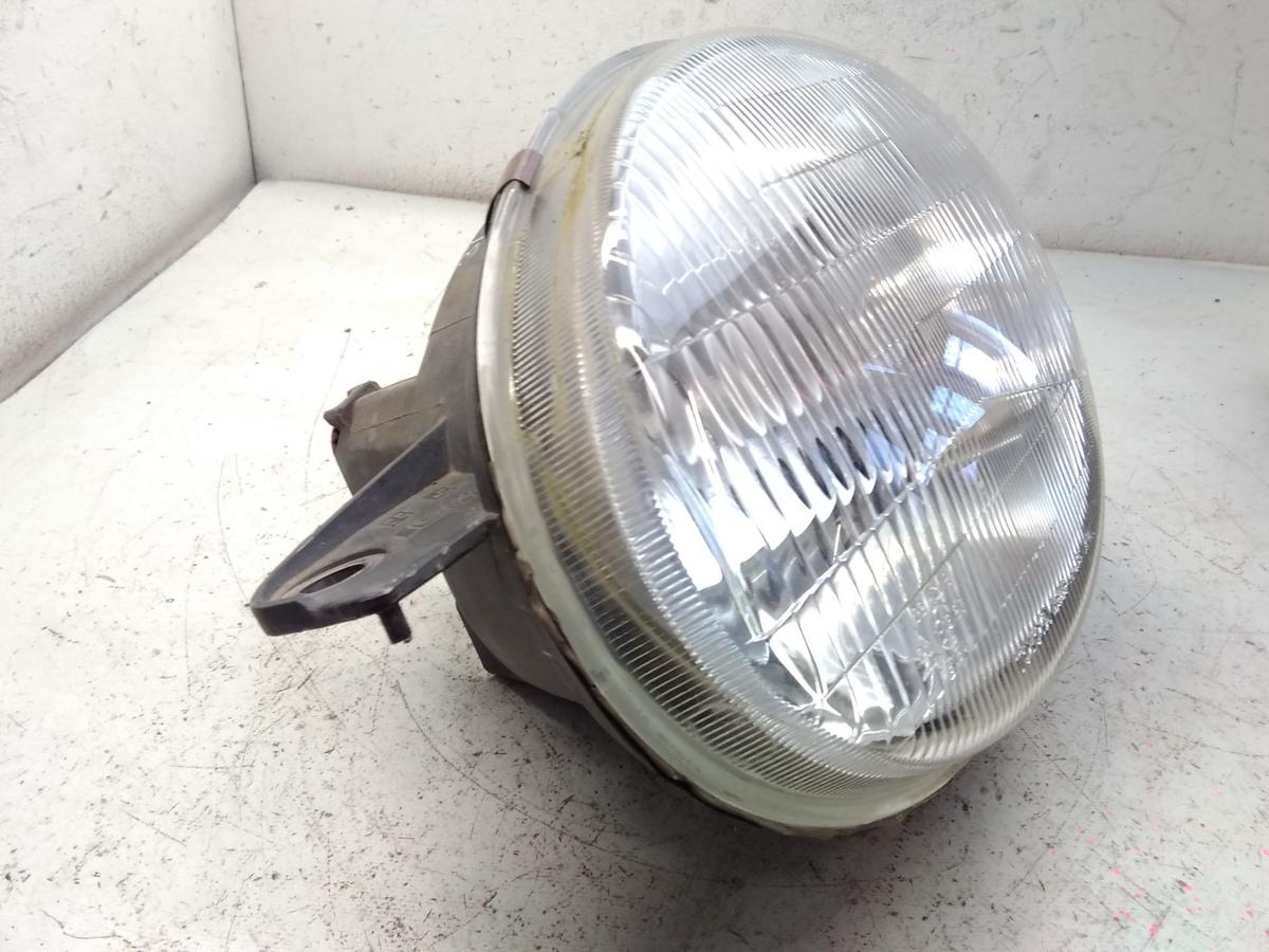 Toyota Corolla E11 original Scheinwerfer links Koito mit LWR BJ1997