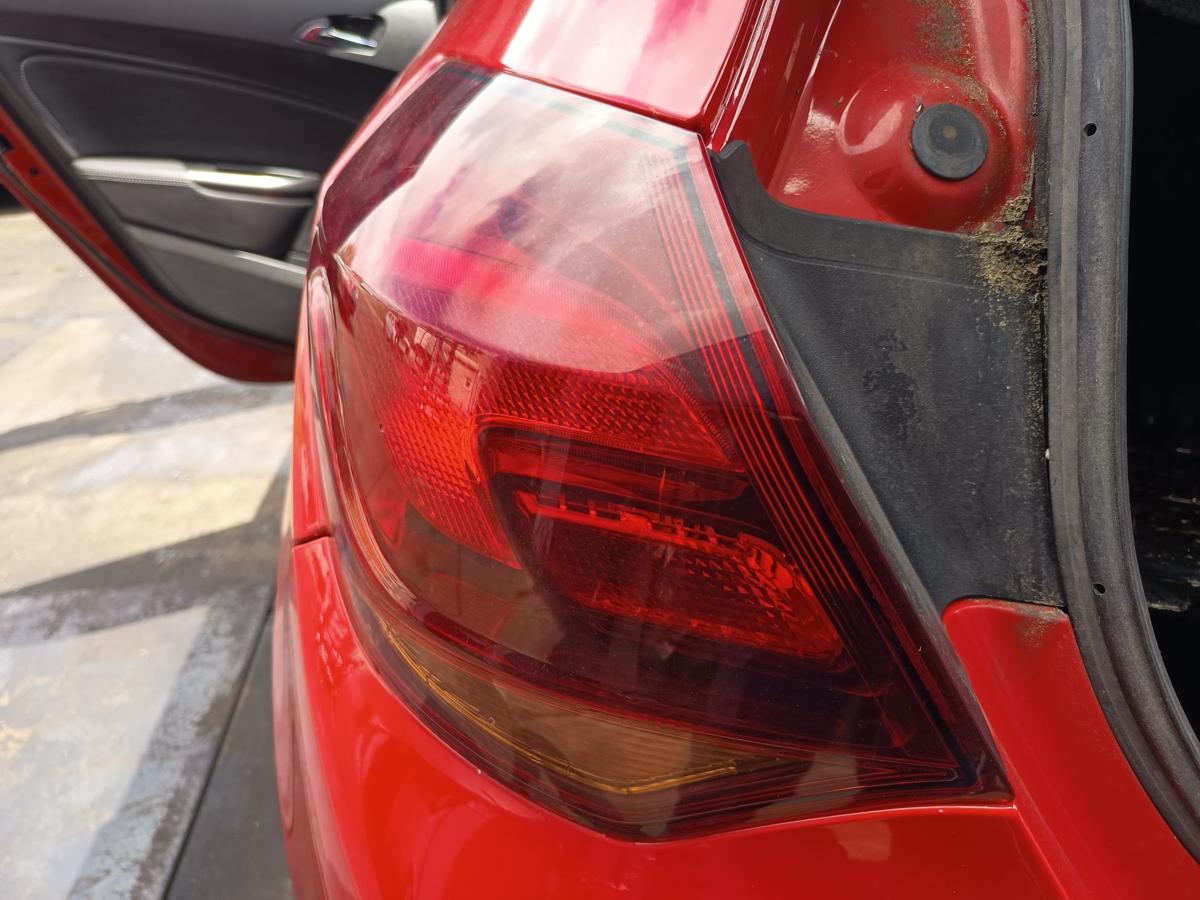 Opel Astra J Limousine R&uuml;ckleuchte links Heck Schluss Licht 3/5t&uuml;rer Bj 2010