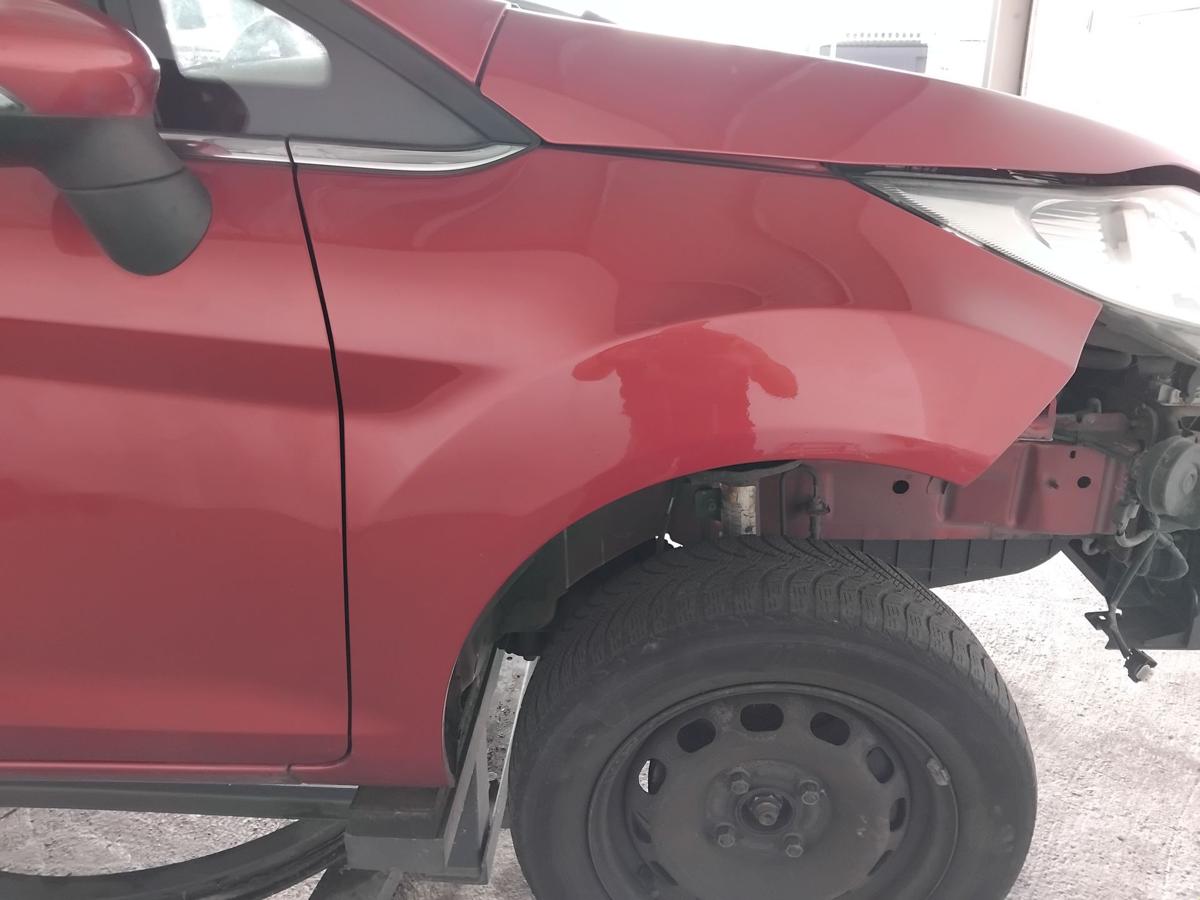 Ford Fiesta JA8 original Kotfl&uuml;gel vorn rechts tangorotmetallic BJ2010