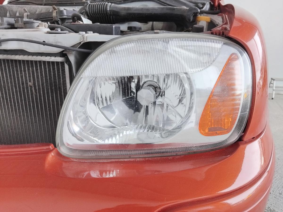Nissan Micra K11 original Scheinwerfer links 260601F511 mit LWR Facelift BJ2001